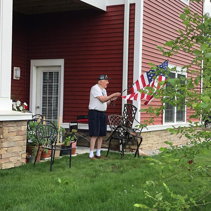 waving flag to family